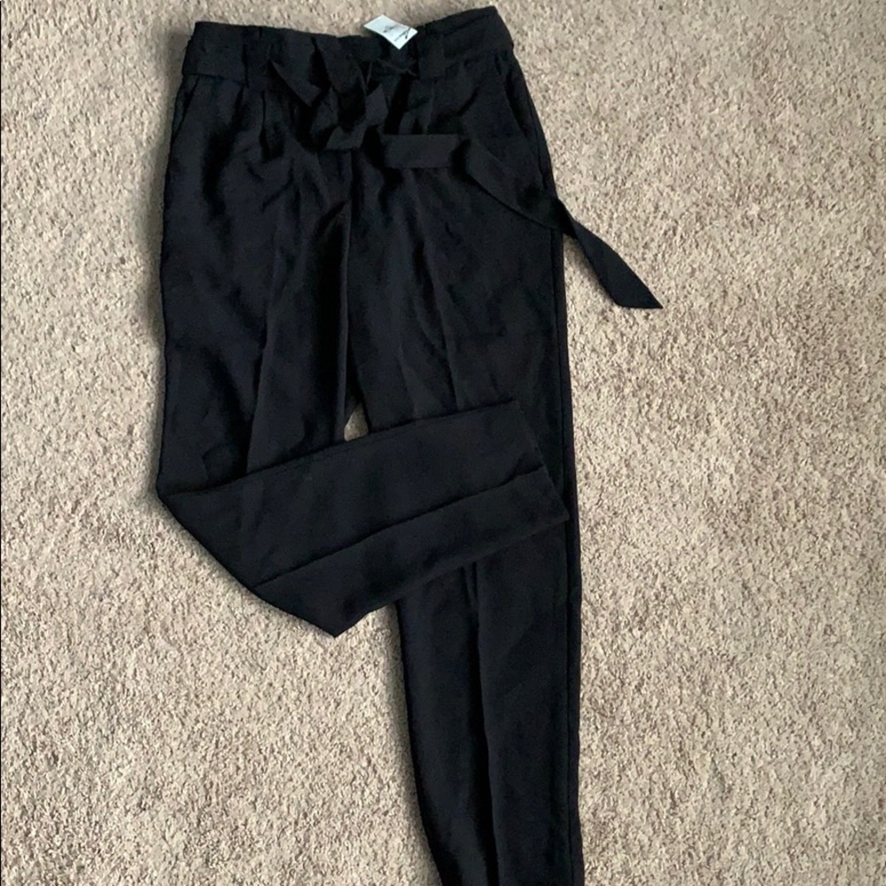 High waisted black slacks